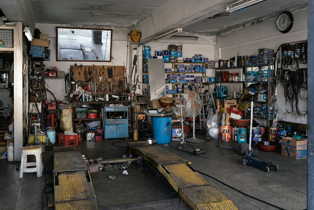 Mechanic workshop with a car on a lift